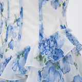 Lang kjole blomstret med volanger med korsettbustier og tynne stropper