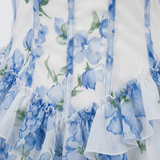 Lang kjole blomstret med volanger med korsettbustier og tynne stropper