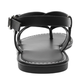Flate damesandaler med kryssende gullremmer, chic, elegante og komfortable