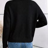 Celine – Chic strikkegenser med elegant blondekrage