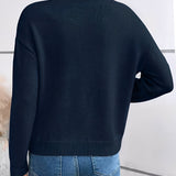 Celine – Chic strikkegenser med elegant blondekrage