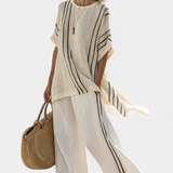 Rafaela – Elegant beige linbluse og bukse med svarte striper