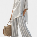 Selma – Elegant asymmetrisk bluse og stripete bukser